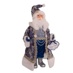 Blue Santa Holding Oversized "Merry Christmas" Sign Table Piece